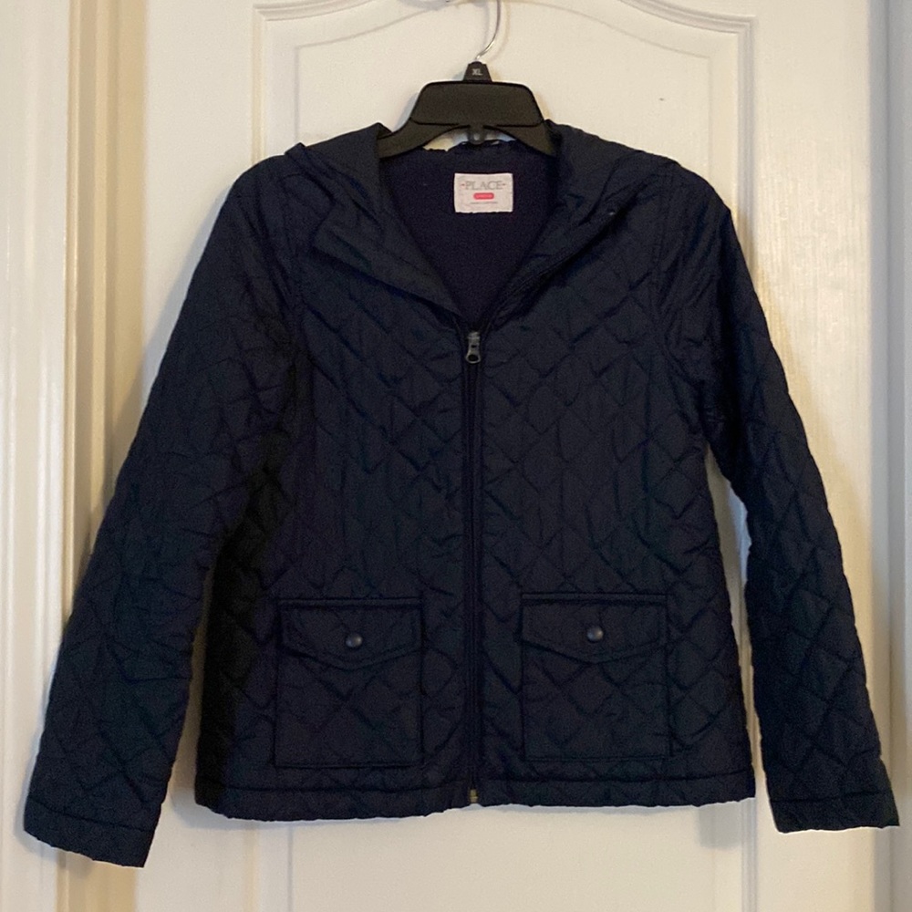 Kids navy blue quilt outer and fleece lined hooded jacket.